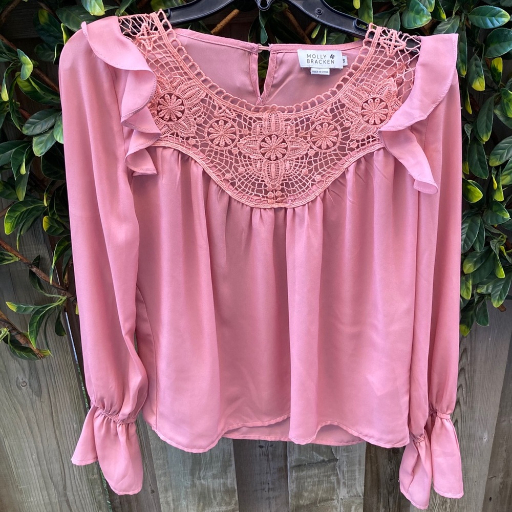 Pink ruffled and embroidered blouse